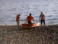 Going crabbing on the Sunshine Coast: Launching a boat at Bonniebrook Beach to put out a crab trap.